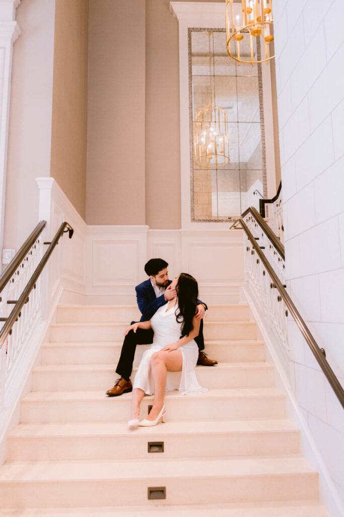 hotel bennett engagement photos of man and woman in white dress and tux 
charleston wedding and engagement photographer near me
luxury wedding photographer charleston