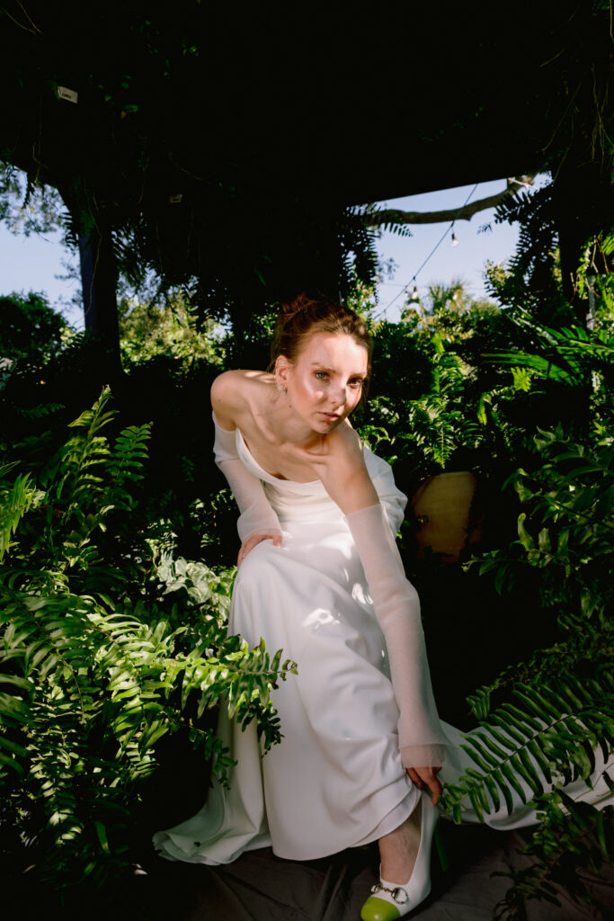 bride vogue inspired with ferns and plants editorial wedding photography