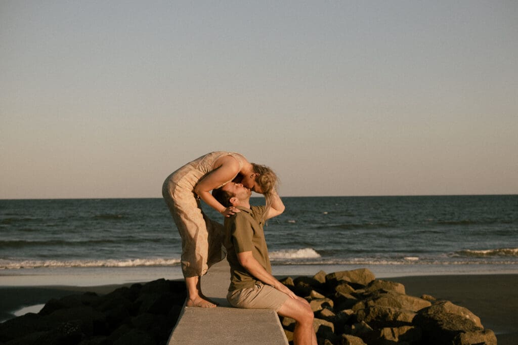 couple walking on beach documentary style photography wedding and engagement