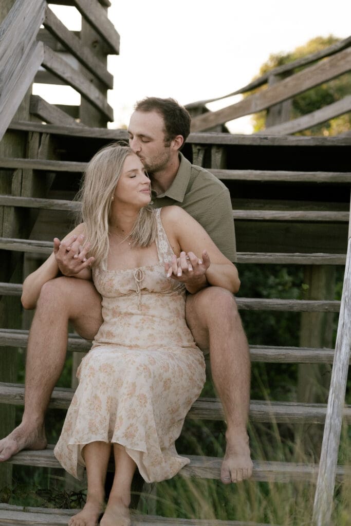 couple sitting on beach documentary style photography wedding and engagement