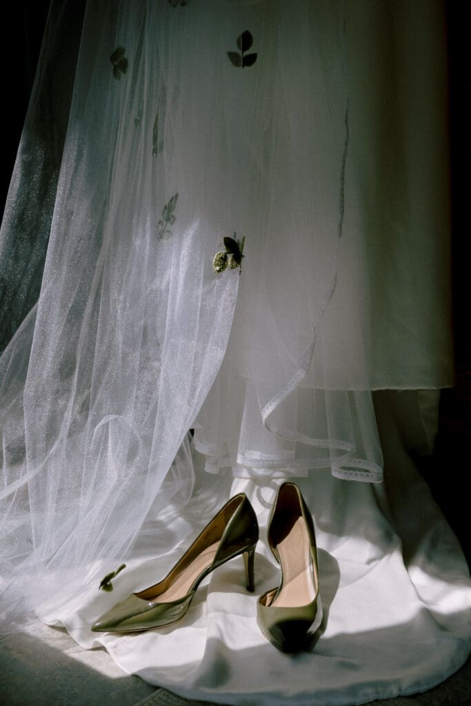 bride shoes with wedding dress moody and documentary luxury style