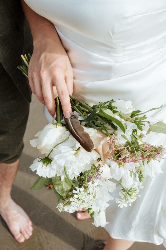 flowers held by bride documentary wedding photography charleston sc