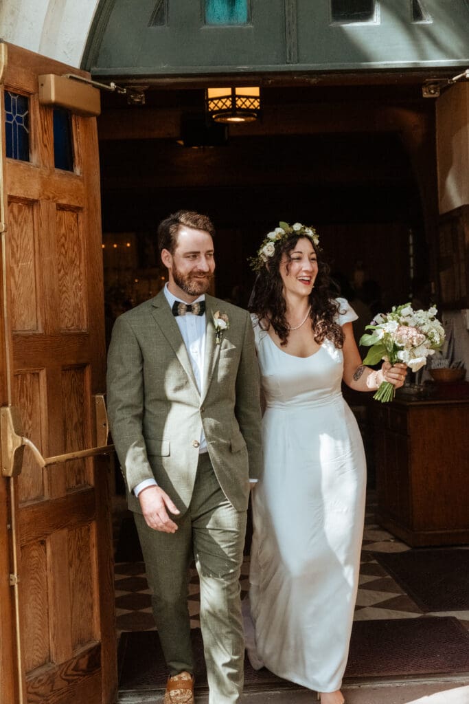 bride and groom after ceremony picture at church sullivans island wedding 