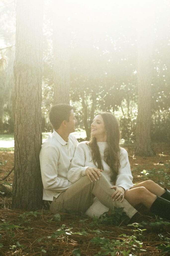 couple under tree hampton park fall inspo hampton park engagement photoshoot