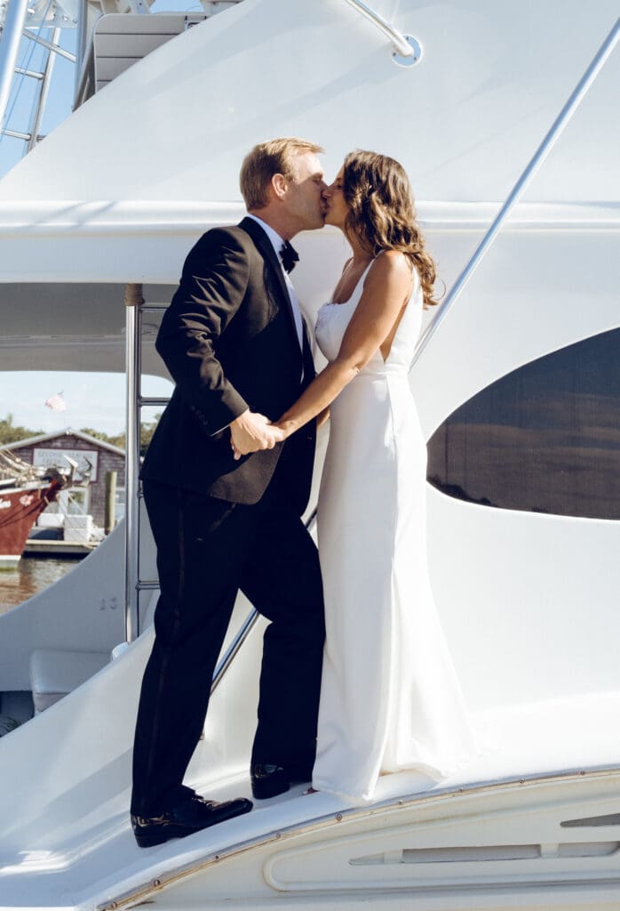 bride and groom editorial style portraits on boat shem creek charleston south carolina