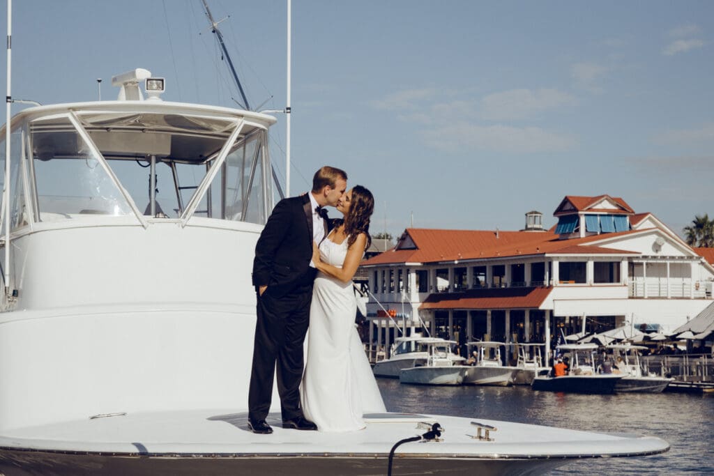 bride and groom editorial style portraits on boat shem creek charleston south carolina