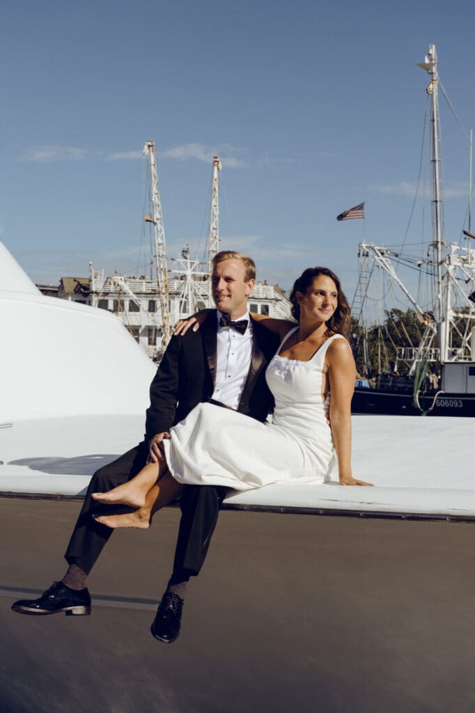 bride and groom editorial style portraits on boat shem creek charleston south carolina