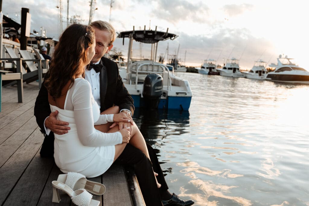 charleston documentary wedding photographer candid couple on boat with sunset