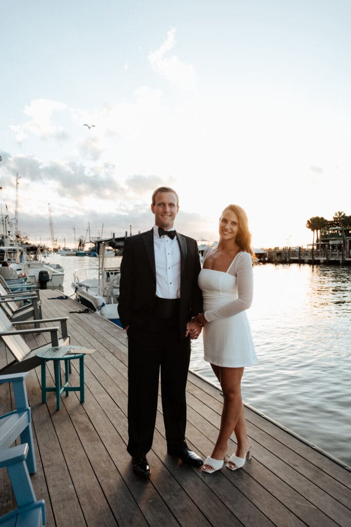 charleston documentary wedding photographer candid couple on boat with sunset