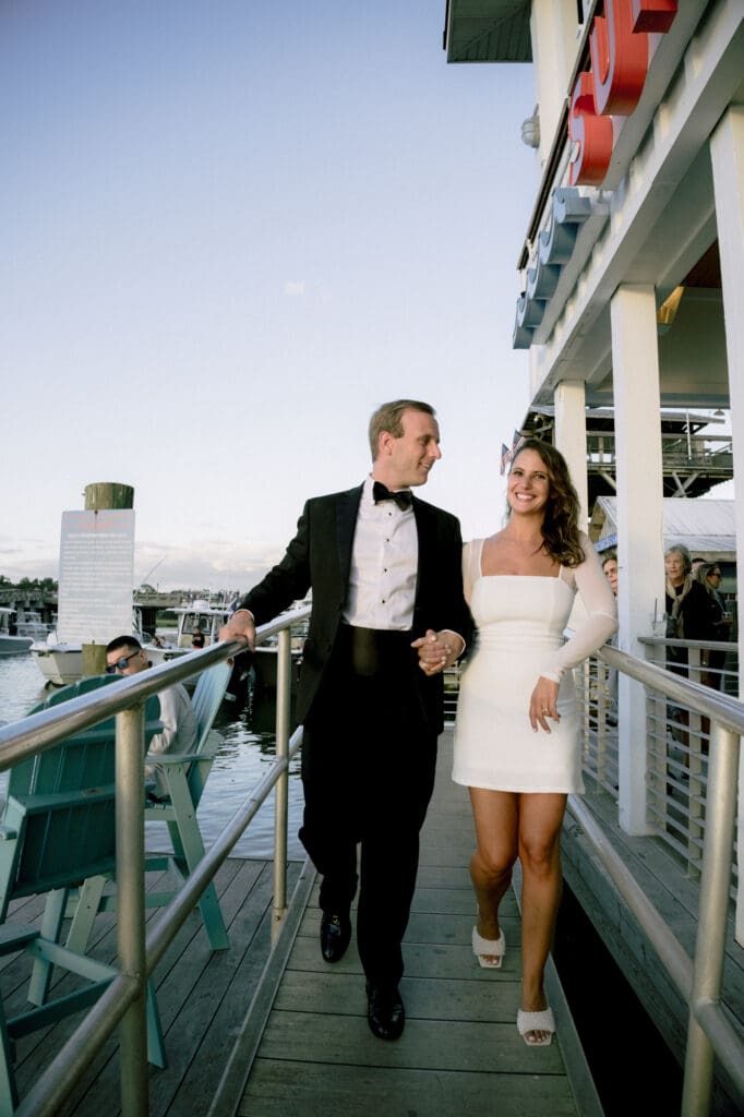 charleston documentary wedding photographer candid couple on boat with sunset