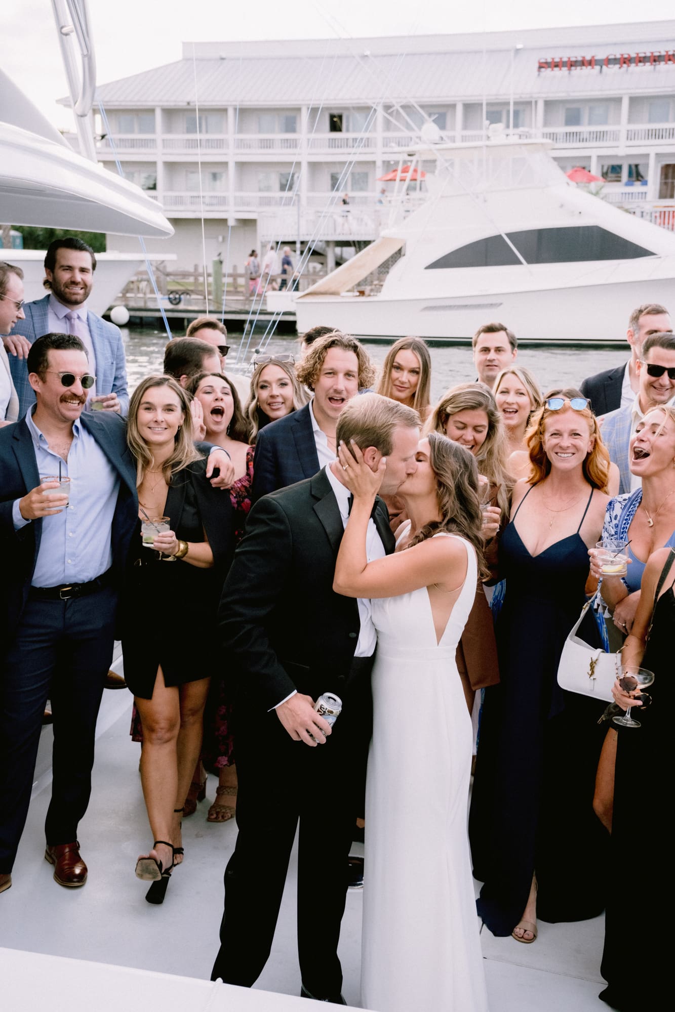 shem creek wedding couple on boat mount pleasant wedding charleston wedding photographer