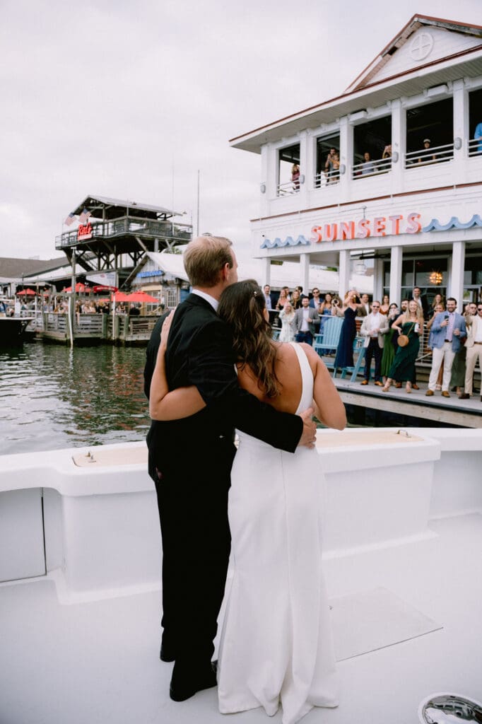 charleston documentary wedding photographer candid couple on boat sunset 