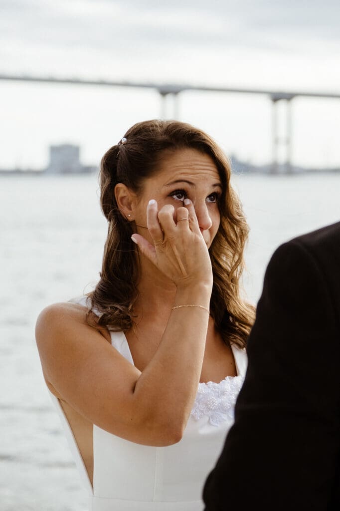 emotional ceremony of bride crying wedding day photos