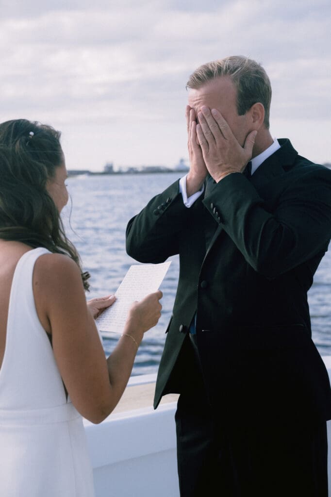 bride emotional during ceremony of wedding on boat