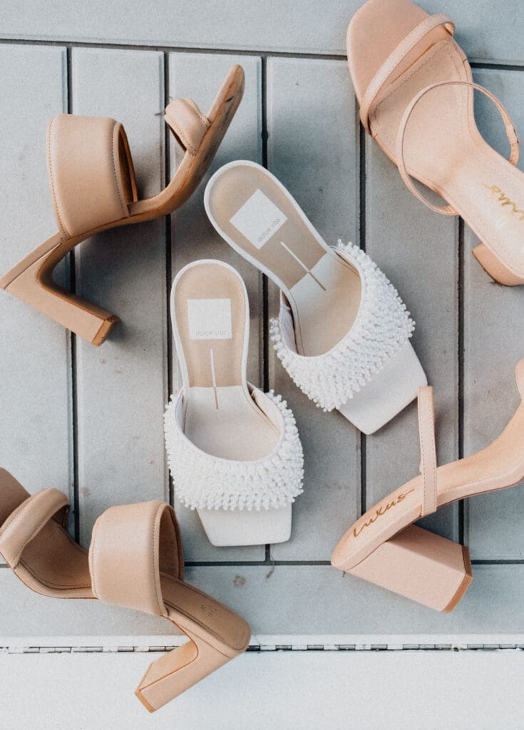 brides and bridesmaid shoes on boat