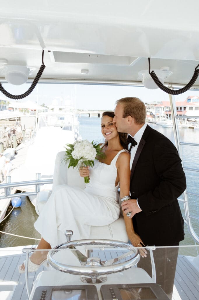 bride and groom editorial style portraits on boat shem creek charleston south carolina