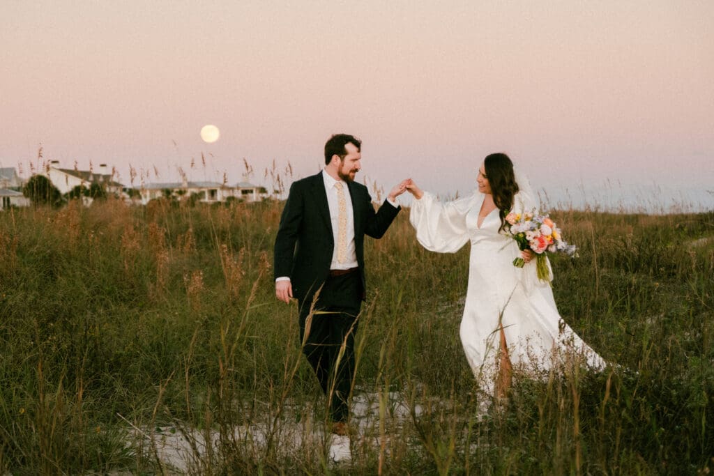 citadel beach club bride and groom portraits on beach