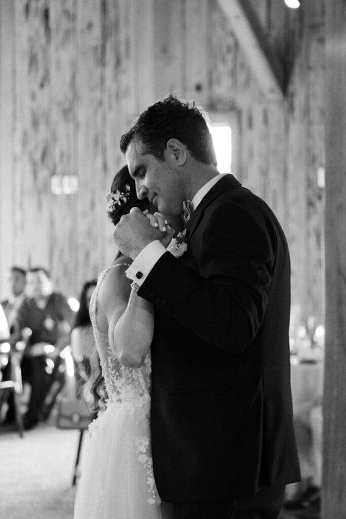 father daughter dancing at cotton dock at boone hall plantation black and white