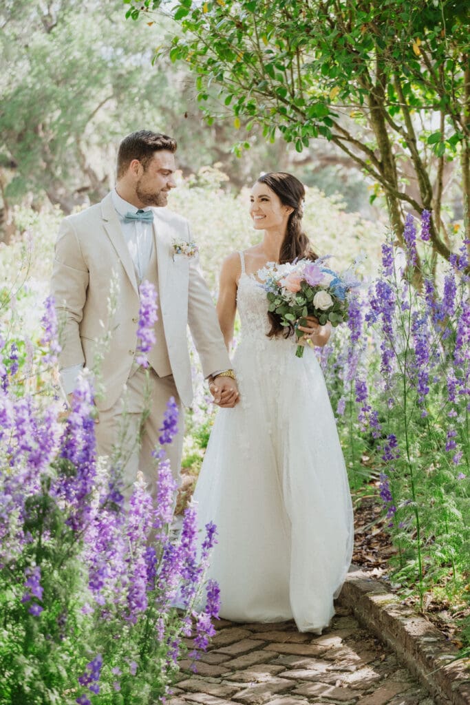 bride and groom portrait with flowers at boone hall plantation