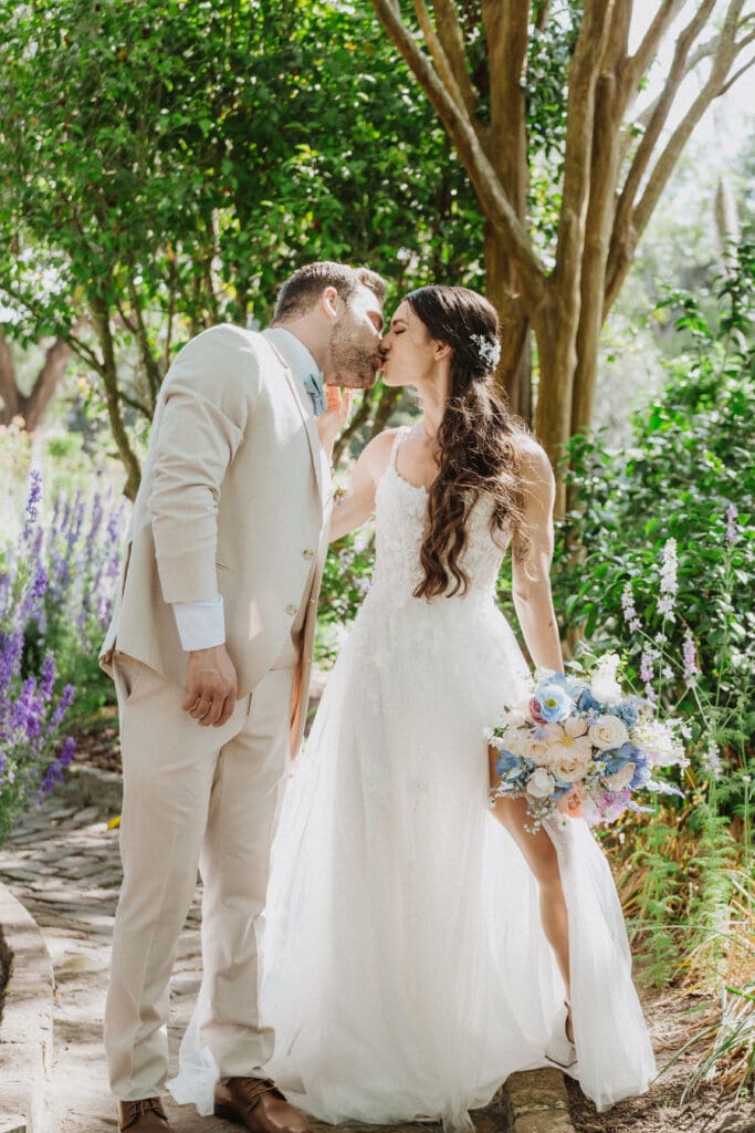 bride and groom portrait with flowers at boone hall plantation