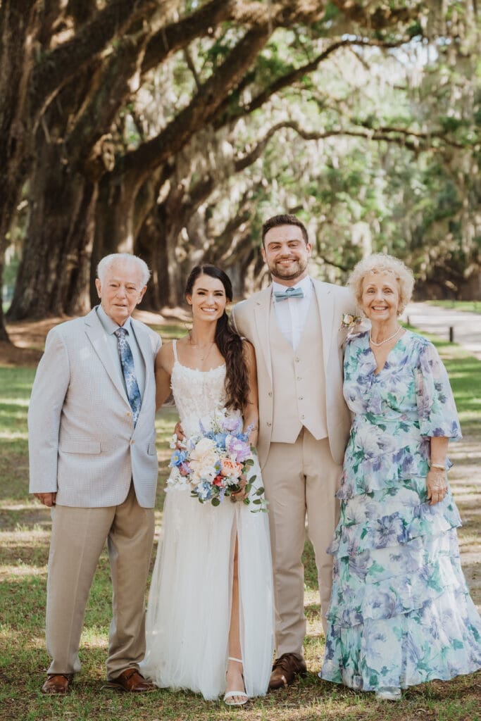 Family photo at Boone Hall Plantation with couple