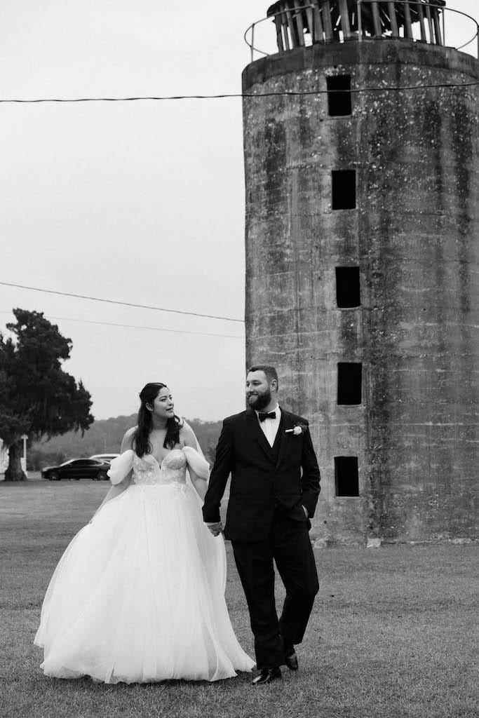 couple portrait walking in black and white 