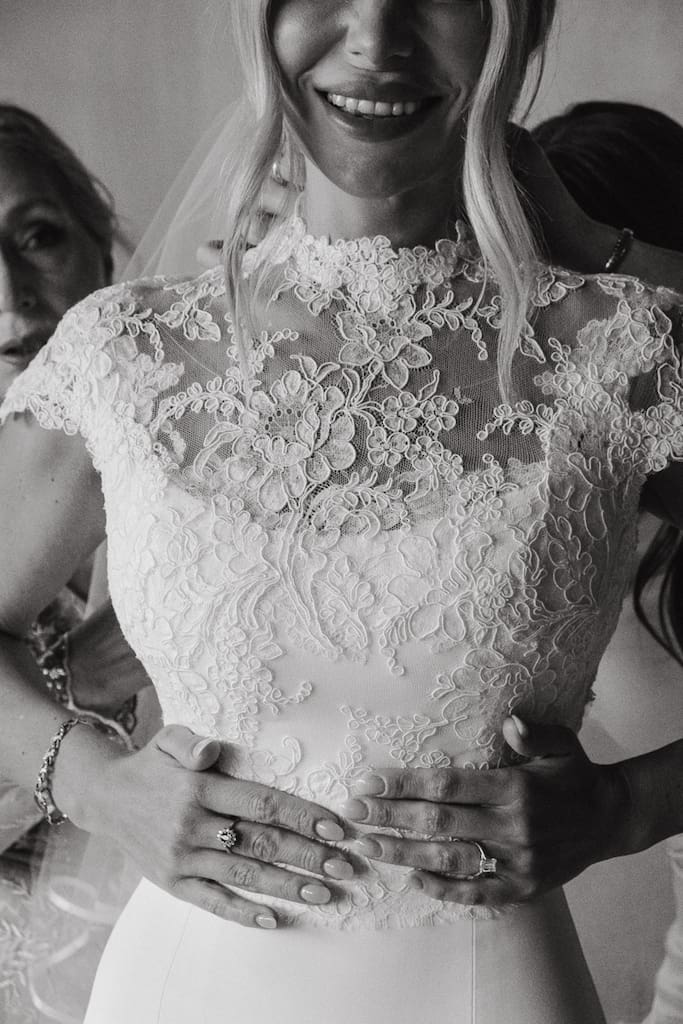 editorial black and white bridal portrait of dress and rings